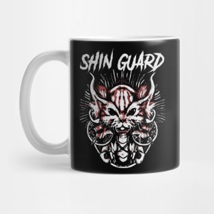 shin guard and the dark fox Mug